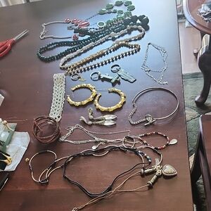 Silver and Gold-Toned Chain Necklaces with Intricate Metalwork